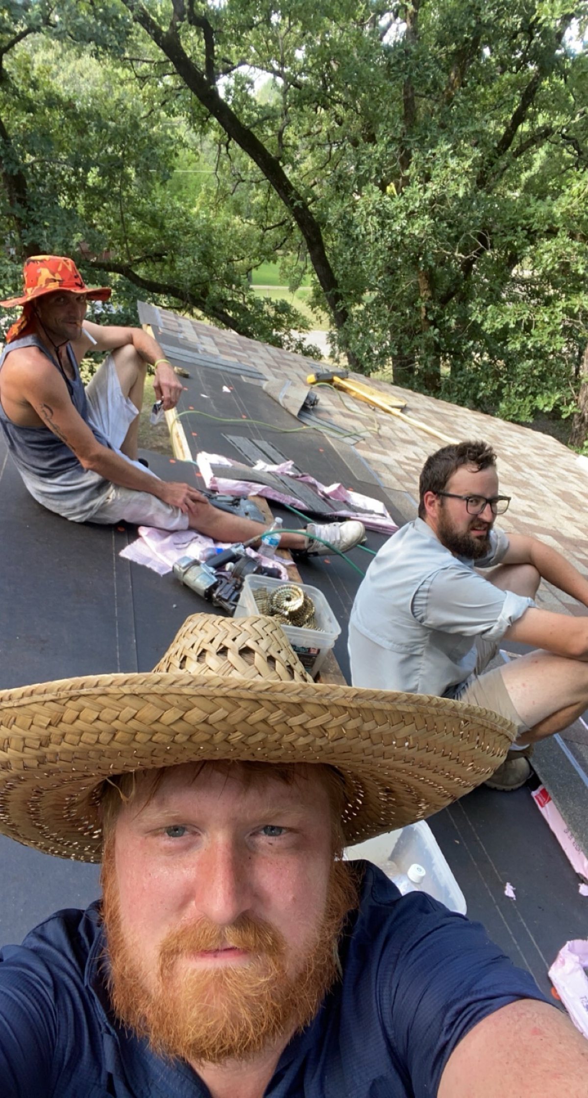 Crew taking a break on a tear-off in East Texas