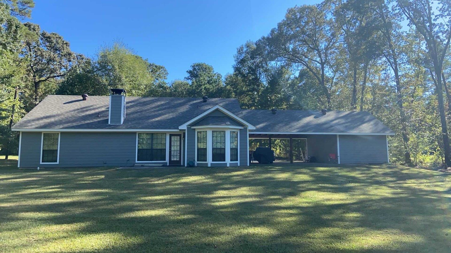 Ranch reroof and siding after