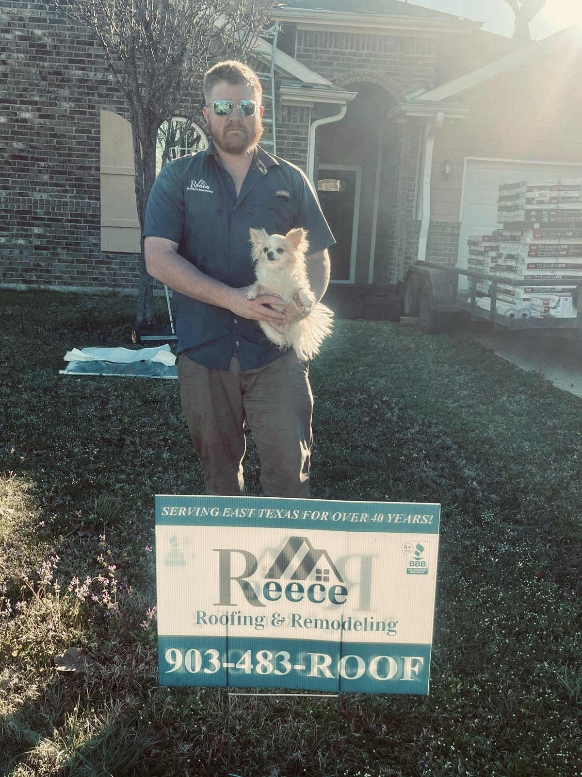 Yard sign and the next generation on a job in East Texas